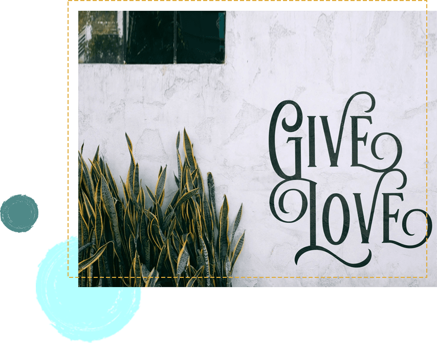 A picture of the words give love on a wall.