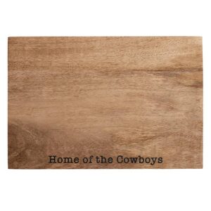 A cutting board that says home of the cowboys.