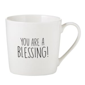 A white mug with the words " you are a blessing !" written on it.