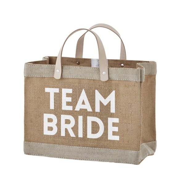 A bag that says team bride on it.