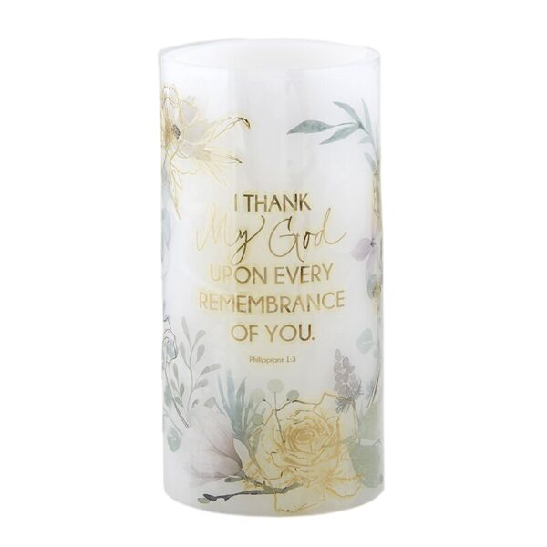 A candle that says " i thank you for every embrasement of you ".