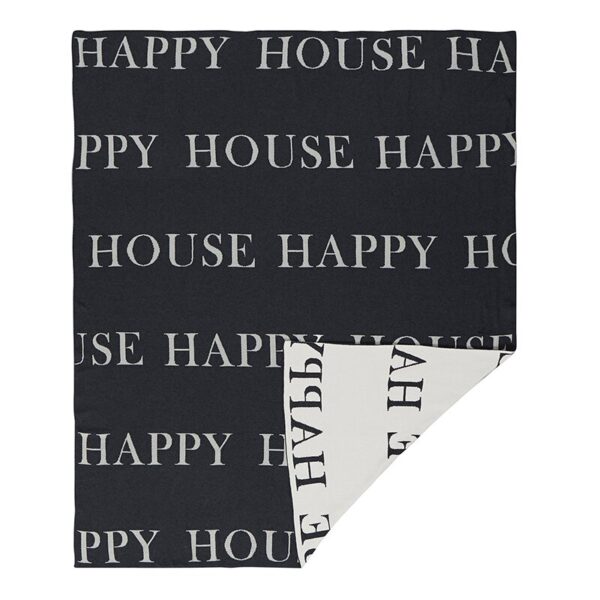 A black and white blanket with the words " happy house."