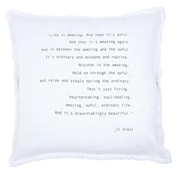 A white pillow with a poem written in black.