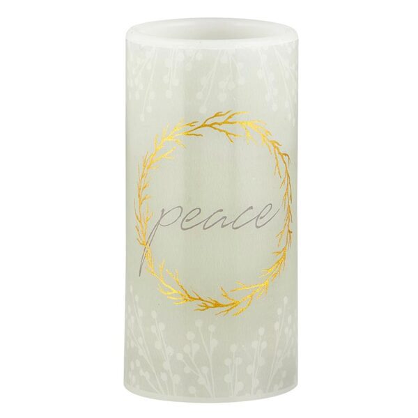 A white candle with the word peace written in gold.