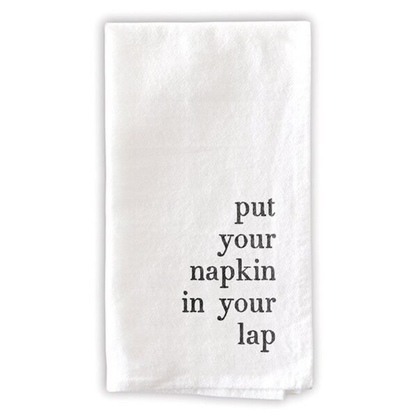 A white towel with the words put your napkin in your lap printed on it.