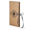 A brown box with a black and white ribbon around it.