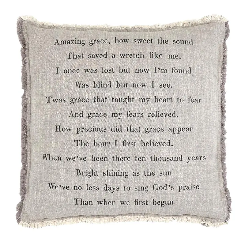 A pillow with the words " amazing grace how great the sound that heard a wreath like you."