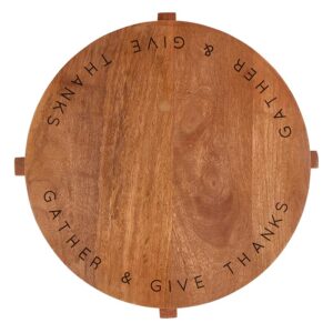 A wooden platter with the words " gather & give thanks ".