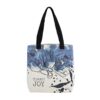 A white bag with blue flowers and black handles.