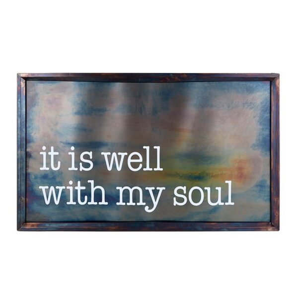 A metal sign that says it is well with my soul.