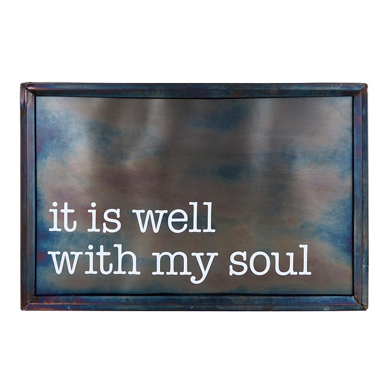 A metal sign that says it is well with my soul.