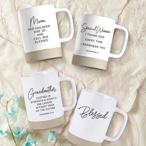 A group of mugs with different verses on them.