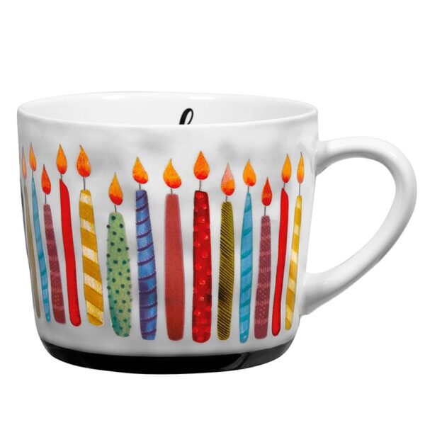 A cup with candles on it