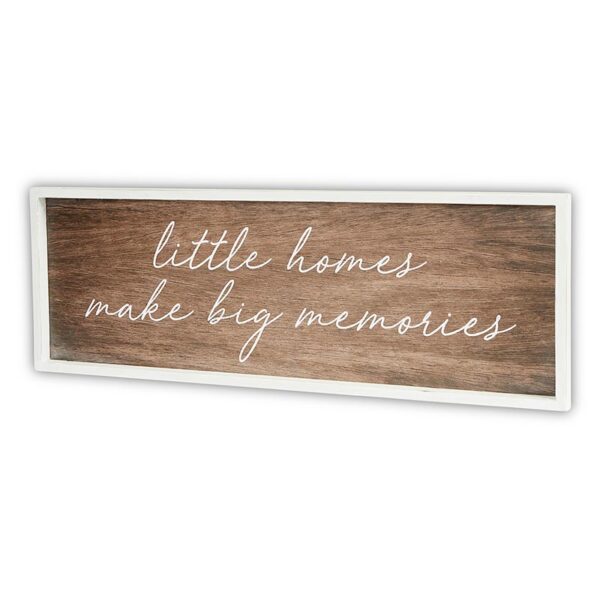 A wooden sign with the words little homes make big memories written on it.