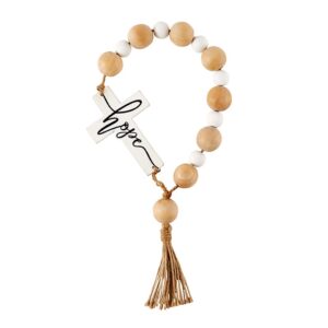 A wooden bead bracelet with a cross and the word " hope ".