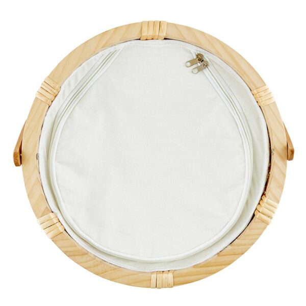 A round mirror with wooden frame and white fabric.