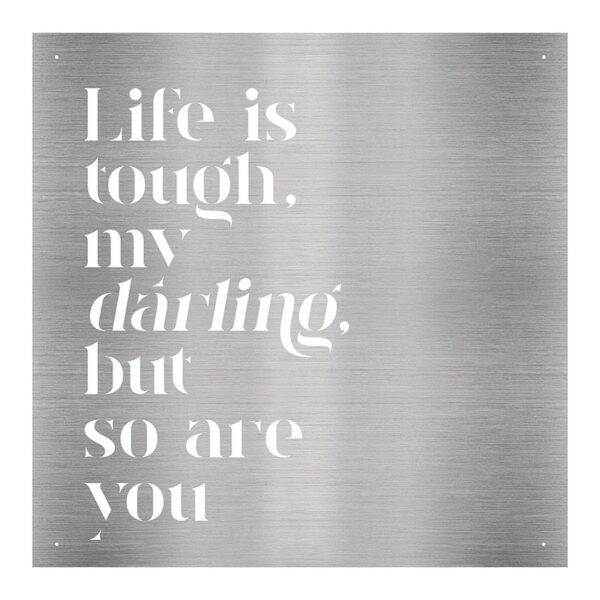 A metal plaque with the words life is tough, my darling but so are you.