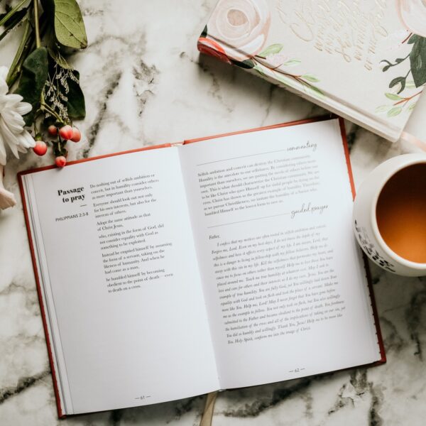 A book opened to the words " read " and " coffee ".