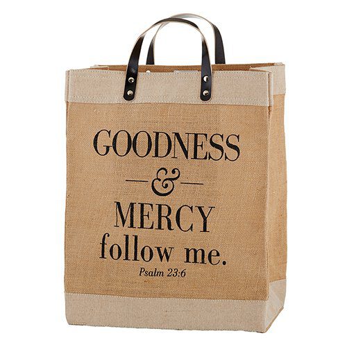 A bag that has the word " goodness and mercy follow me ".