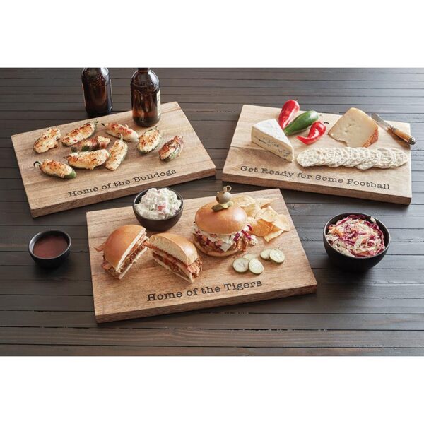 A wooden cutting board with sandwiches on it