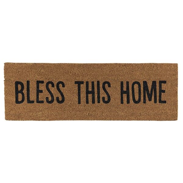 A brown door mat that says " bless this home ".