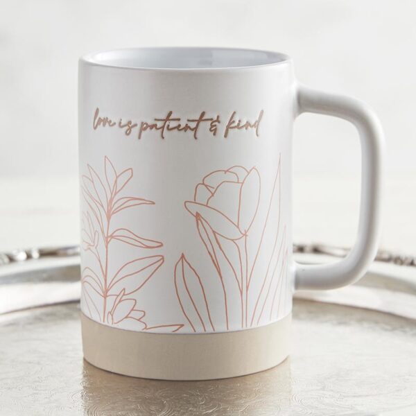 A coffee mug with the words " being patient is hard ".