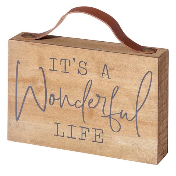 A wooden sign that says it's a wonderful life.