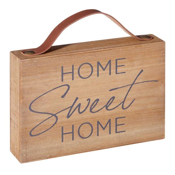 A wooden sign that says home sweet home.