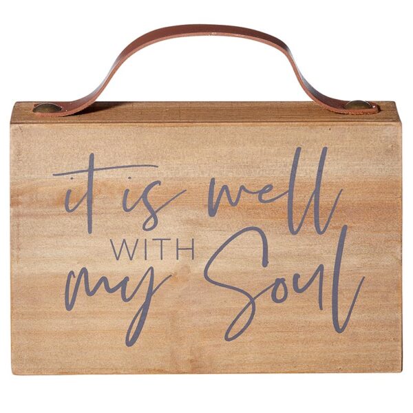 A wooden sign that says it is well with my soul.