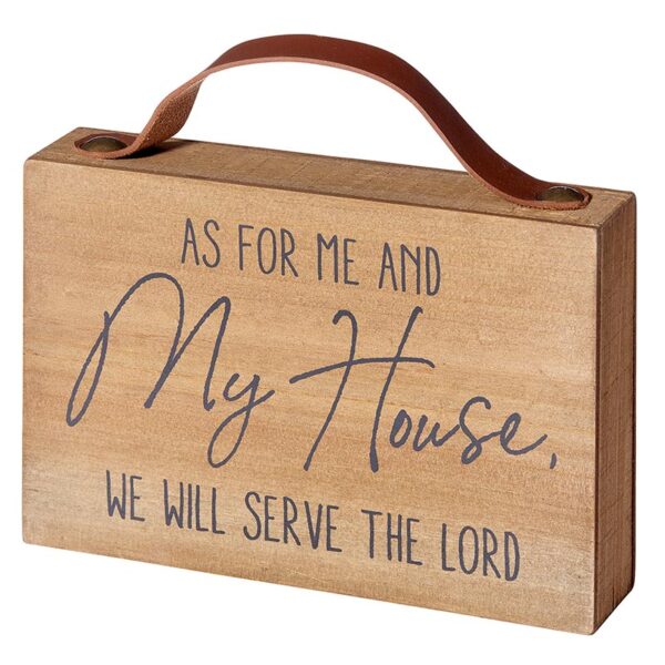 A wooden sign that says as for me and my house, we will serve the lord.