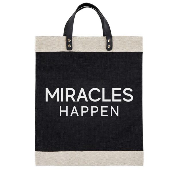 A black and white bag with the words " miracles happen ".