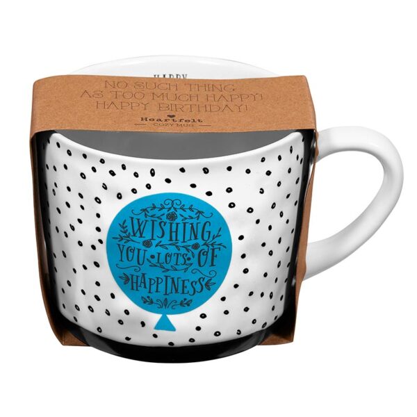 A white mug with black dots and blue lettering.