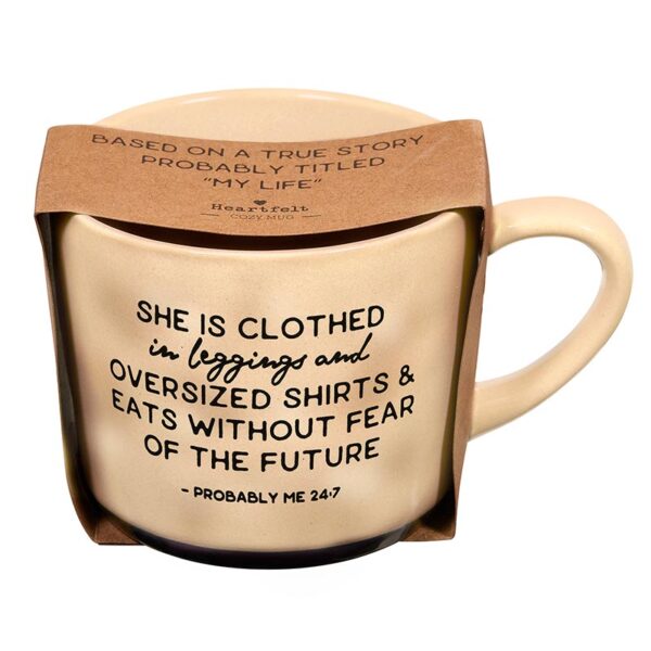 A mug with the words " she is clothed in leggings and oversized shirts, eats without the future ".