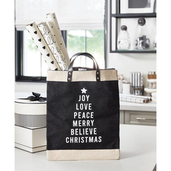 A black and white bag with words on it