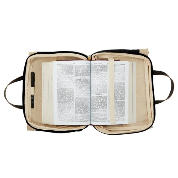 A bible is open and opened to the page.